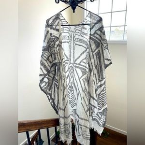 Gray and white over the shoulder throw